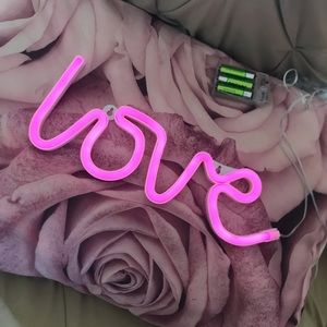Neon pink LOVE sign